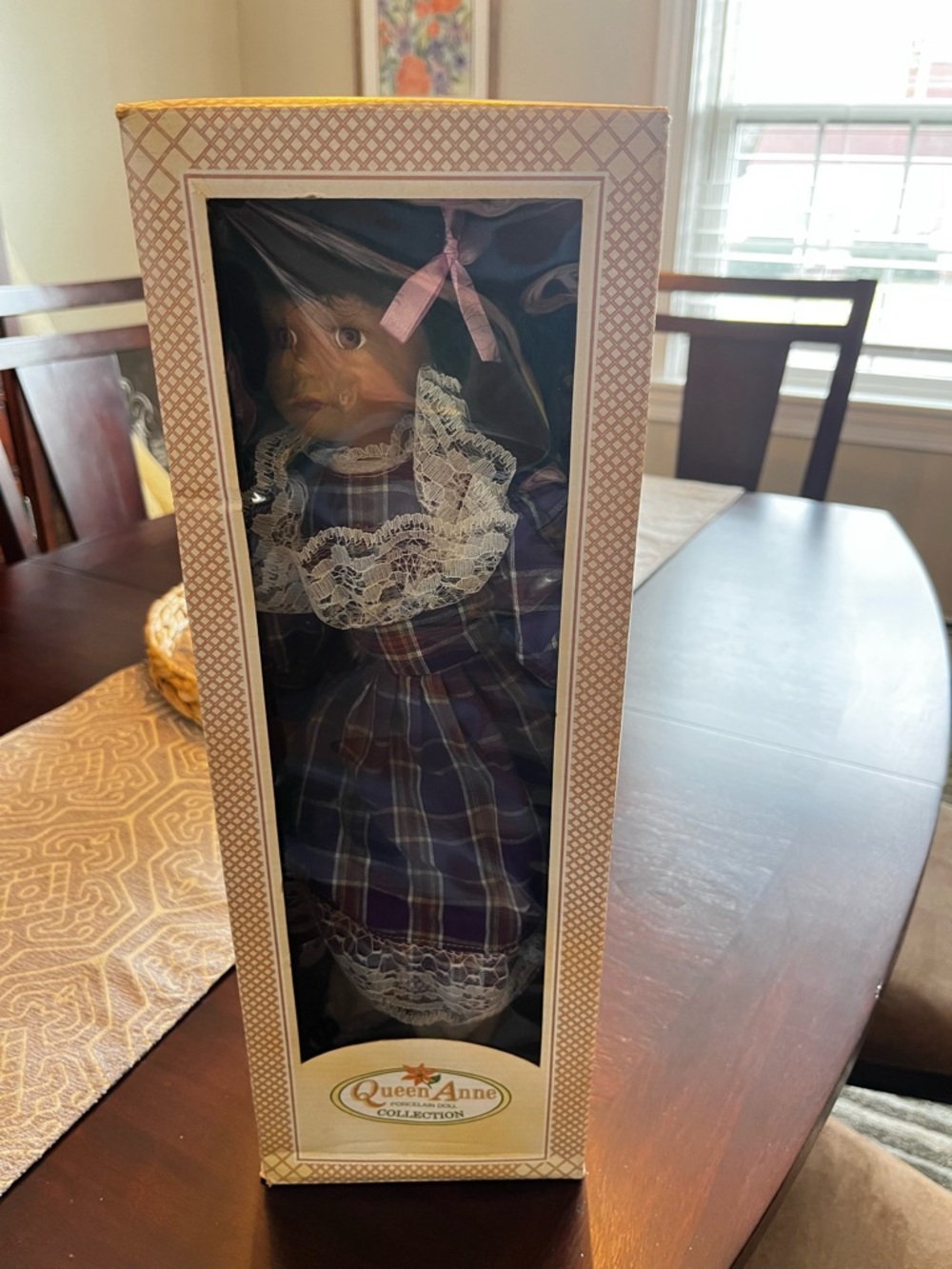 Queen Anne Afro American porcelain doll.  New in box